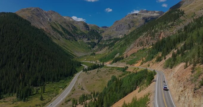 Elevated of mountain roadway by rugged San Juan terrain, Million Dollay Highway Colorado USA