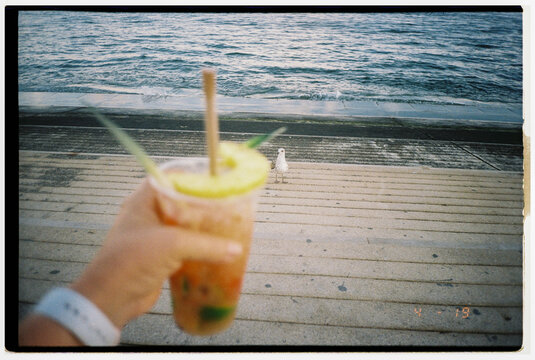 Hand Holding Refreshing Drink. Film Flash UGC