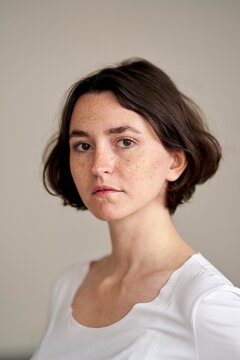 Portrait of a Thoughtful Young Woman With a Calm Expression
