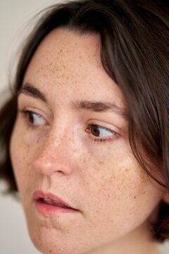 Woman in Soft Light Showing Calmness and Contemplation