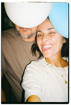 Funny couple selfie blocked by balloon