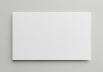 Fototapeta premium A blank white canvas is displayed against a light gray background. The scene is minimalistic and devoid of any additional elements.