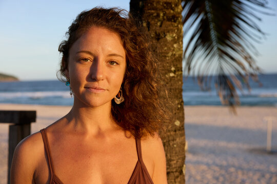 Woman at Beach During Golden Hour