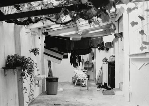Real internal patio with clotheslines in a cozy home