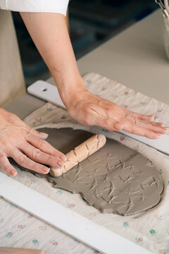 Creating Handcrafted Pottery With Clay in a Cozy Studio Environment