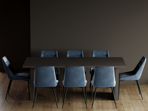 Dinning area with large table and 8 chairs. Minimalist dark design