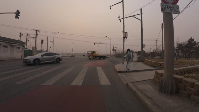Pedestrians walking in strong sandstorm wind in Beijing China