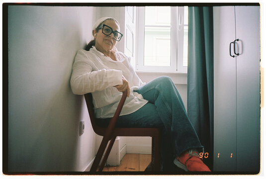 Woman Chair by the Window