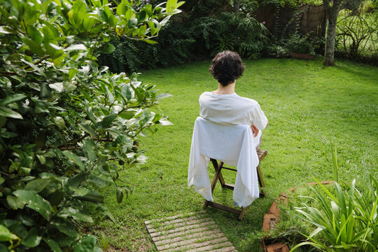 Male enjoying time alone in the backyard