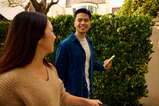Couple is walking down the street