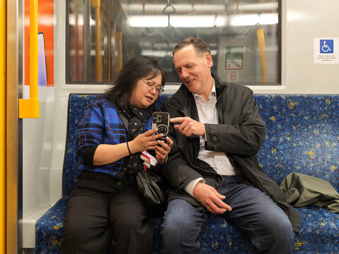 Friends Enjoying Time on the Subway While Sharing Moments