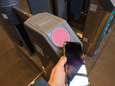 Using a Smartphone to Access a Transit Turnstile at a Station