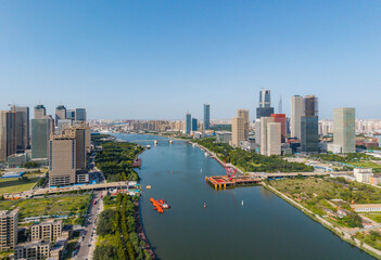 Obraz premium Aerial view of the Haihe River Commercial District at Yajiaqiao in Tianjin Binhai New Area
