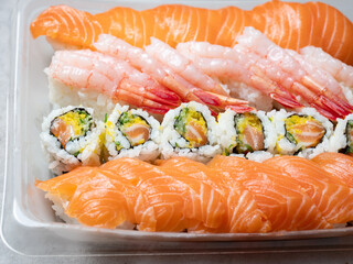 Different types of sushi on a plate © mnimage