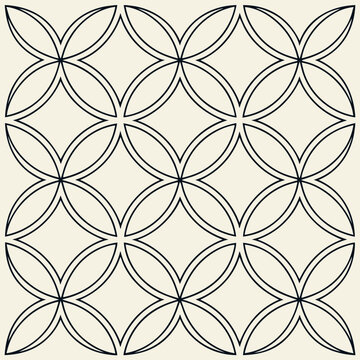 A seamless abstract geometric pattern is formed by a grid of interlocking circular shapes, creating a decorative background.