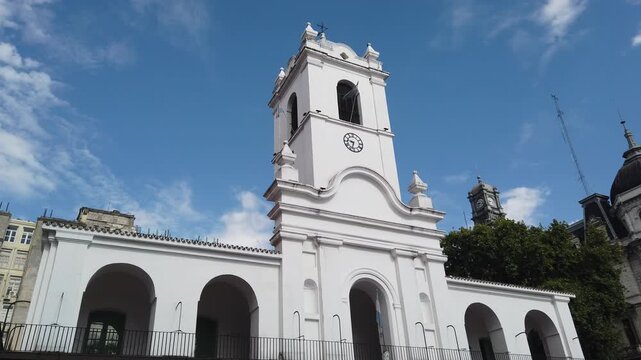 Establishing White Colonial Cabildo Historic Building with National Flags and Skyline in Buenos Aires Argentina