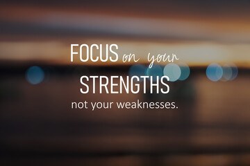 Obraz premium Sunset background with inspirational quotes - focus on your strengths not your weaknesses