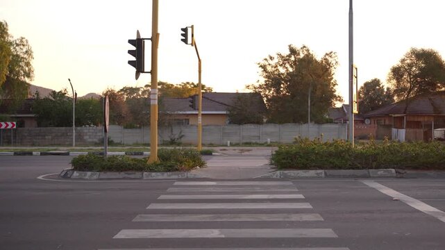 4K SHOT OF PEDESTRIAN ZEBRA CROSSING IN EVENING LIGHT - GABORONE BOTSWANA