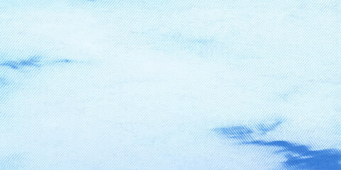 A bright winter nature background featuring a blue sky with clouds over a fresh white snow texture and frozen ice crystals © MDJAHIRULISLAM