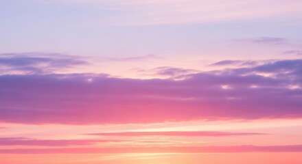 Fototapeta premium Beautiful pastel dawn sky blending soft pink and blue tones.