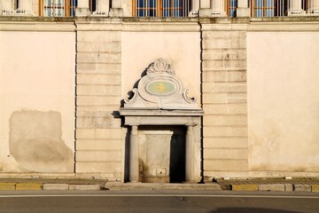 Historic Marble Fountain with Ornate Carvings, Classical Marble Fountain Embedded in Historic Building