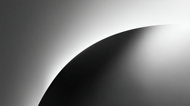 A black and white image of a partial eclipse with a bright light