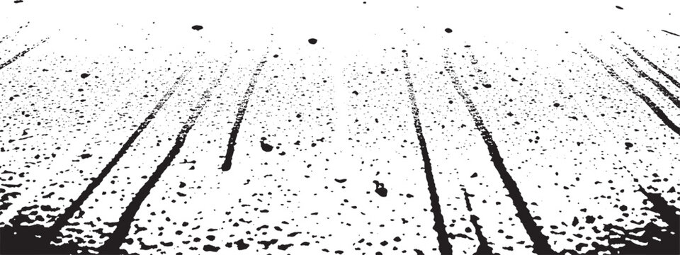 Abstract grunge texture with black paint drips and splatters on white background.