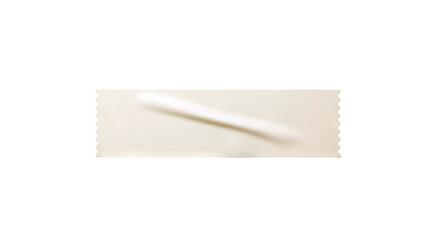 Beige fabric swatch with serrated edge