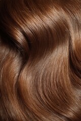 Fototapeta premium Close up of wavy brown hair texture
