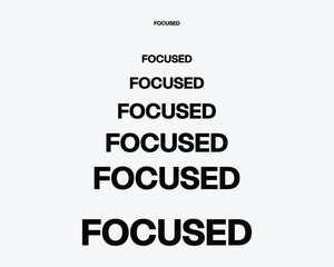 Obraz premium Minimal typography design featuring the word “Focused” repeated in increasing sizes, symbolizing concentration, productivity, discipline, and success mindset.
