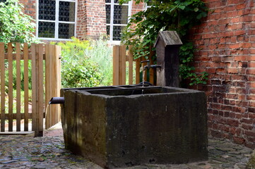 Well in the Historical Monastery L&uuml;ne in the Town L&uuml;neburg, Lower Saxony