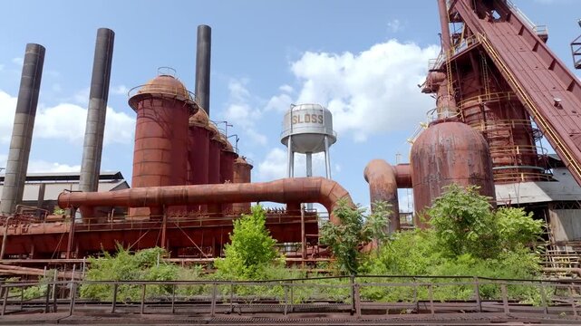 Sloss Furnaces National Historic Site in Birmingham, Alabama with drone video moving up close up.