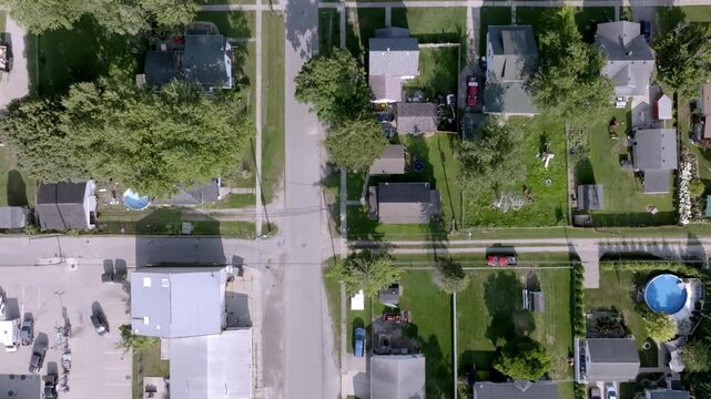 Neighborhood homes in Capac, Michigan with drone video overhead.