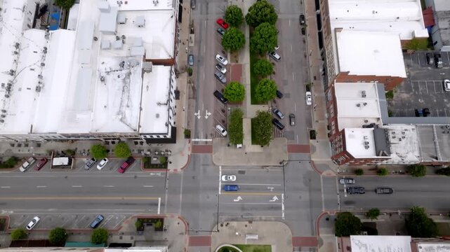 Downtown Macon, Georgia with drone video overhead and tilting up.