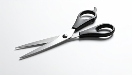 Obraz premium Scissors open, black handles, silver blades on white background