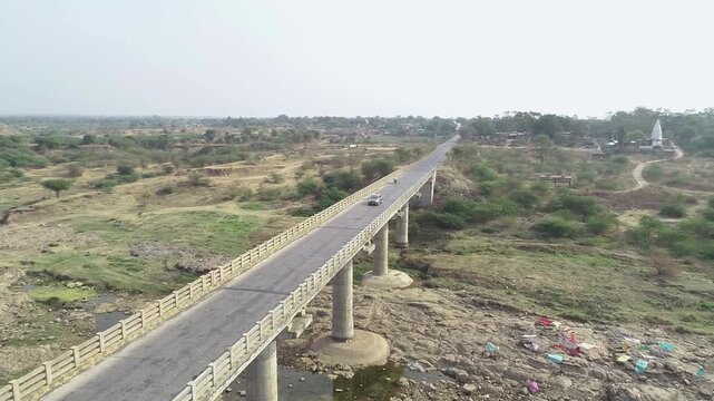 Big bridge on river with some vehicle run 