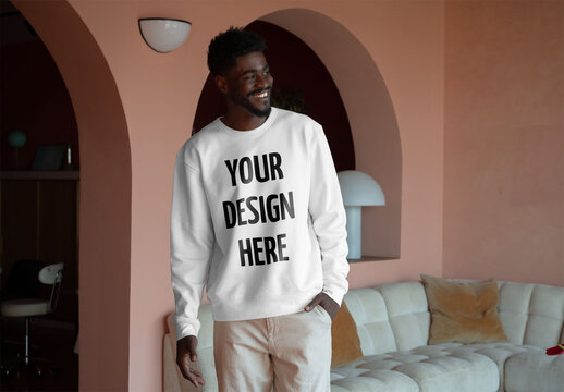 Mockup Of Man Dressed In Customizable Sweatshirt At Home