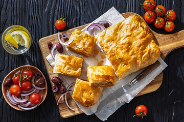 Greek savory sliced meat bougatsa pie with olives