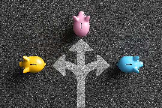 Piggy banks choosing investment path on asphalt road