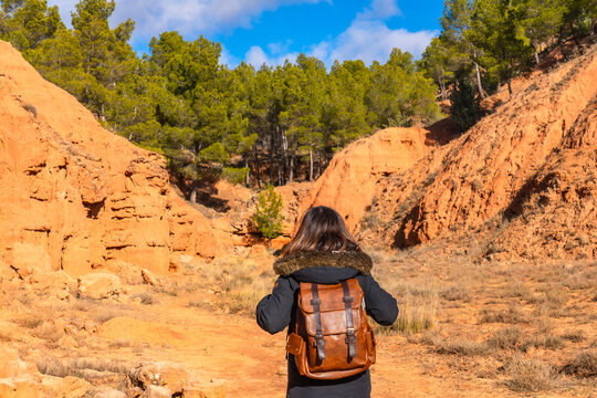 Hiker exploring las arcillas natural park teruel spain canyon