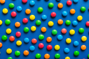 colorful candies as background top view. Seamless pattern with candy. Many sweet candies close-up
