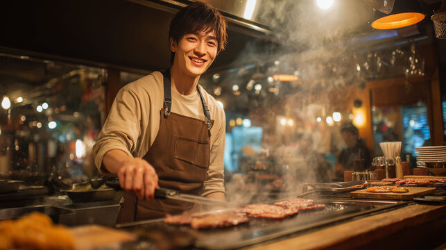 混雑する焼肉居酒屋で連携プレーする男性スタッフ、達成感に満ちた接客風景