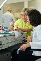 Fototapeta premium portrait of female dentist with prosthesis