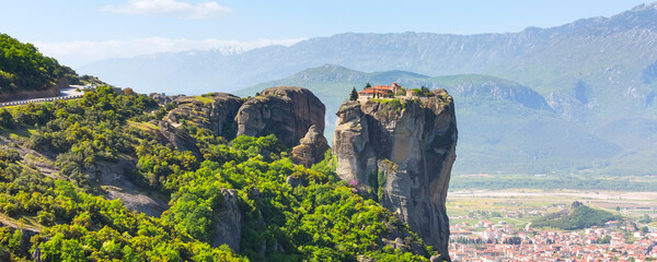 Aerial view of monastery at Meteora cliff and Kalambaka town, Greece