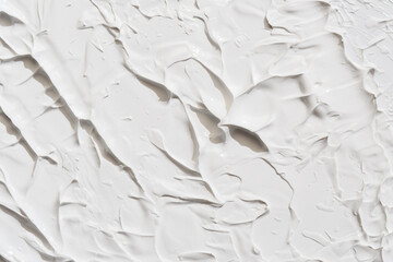 Thick white clay or cream texture with bold spatula ridges and soft shadows, abstract background...