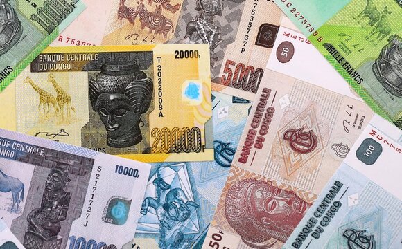 CFA franc money bills pile on table. Republic of the Congo banknotes of XAF currency close up.