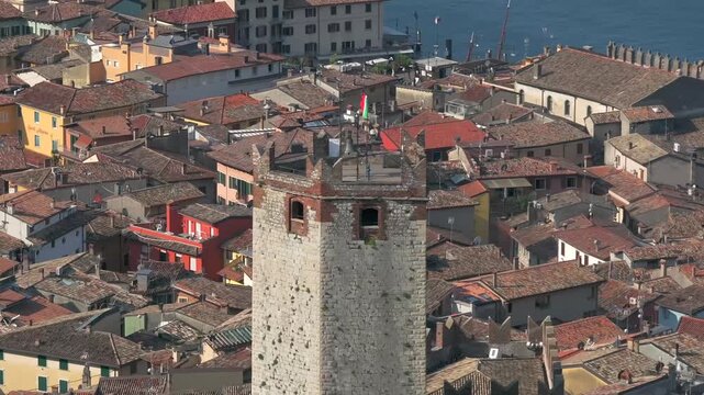 Europe Italy Lake Garda Malcesine village with Castle Zoom Footage cinematic aerial 4K view Summer