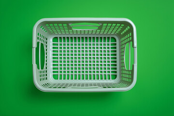 Minimal green shopping basket on a monochrome background representing eco retail, sustainability and Earth Day themes.