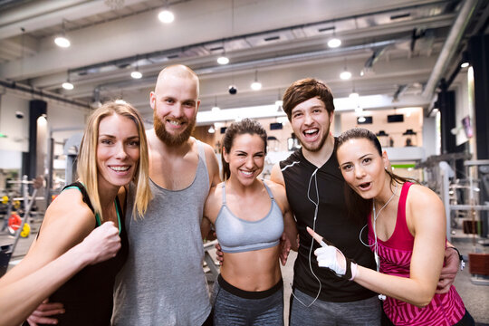 Fit friends having fun in gym