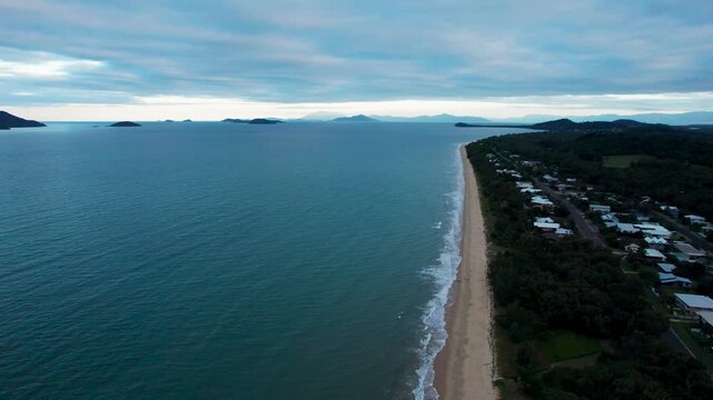aerial shot over Mission Beach on a cloudy day in Queenlsland, Australia